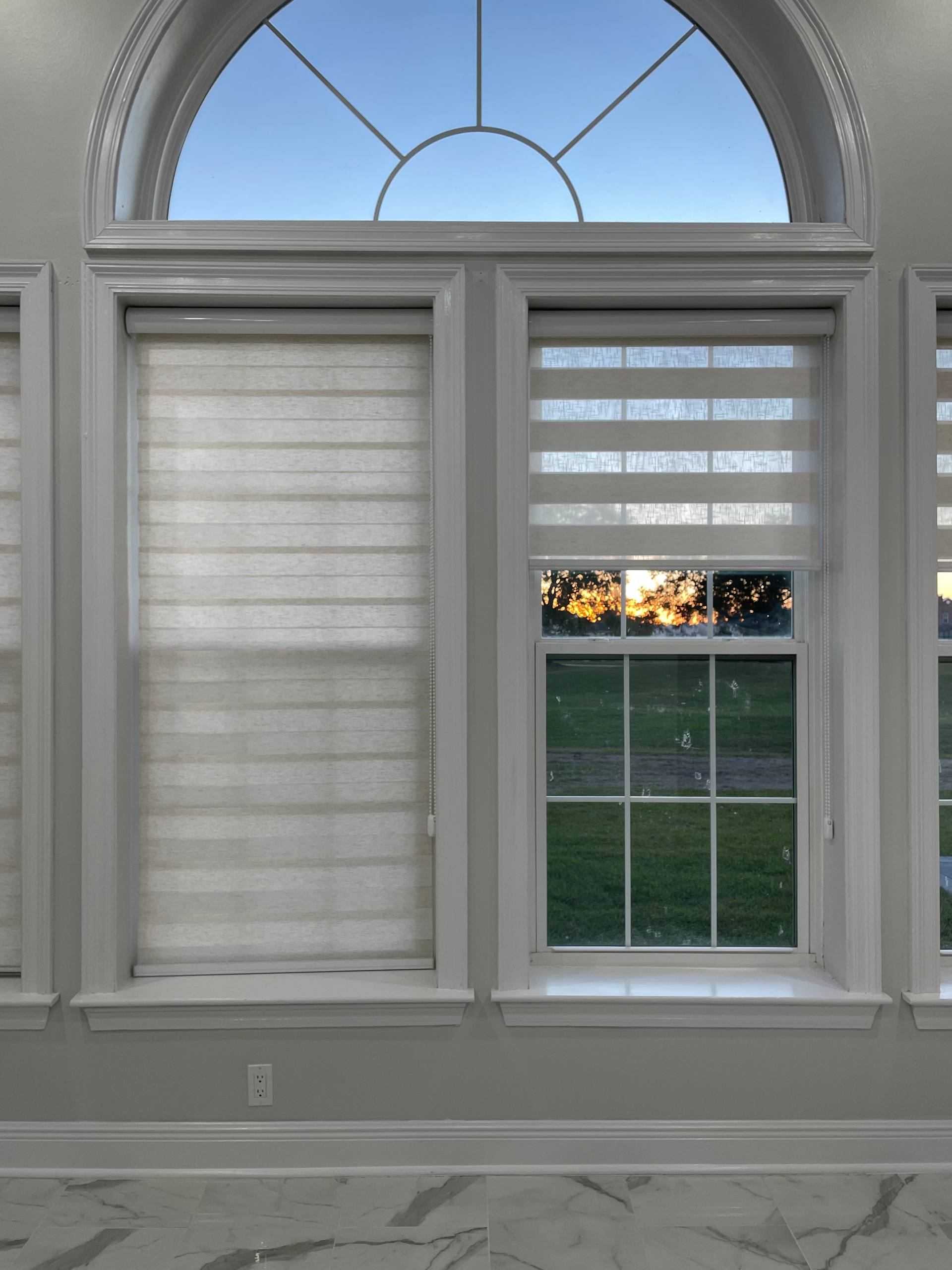 Contemporary living space with minimalist window treatments