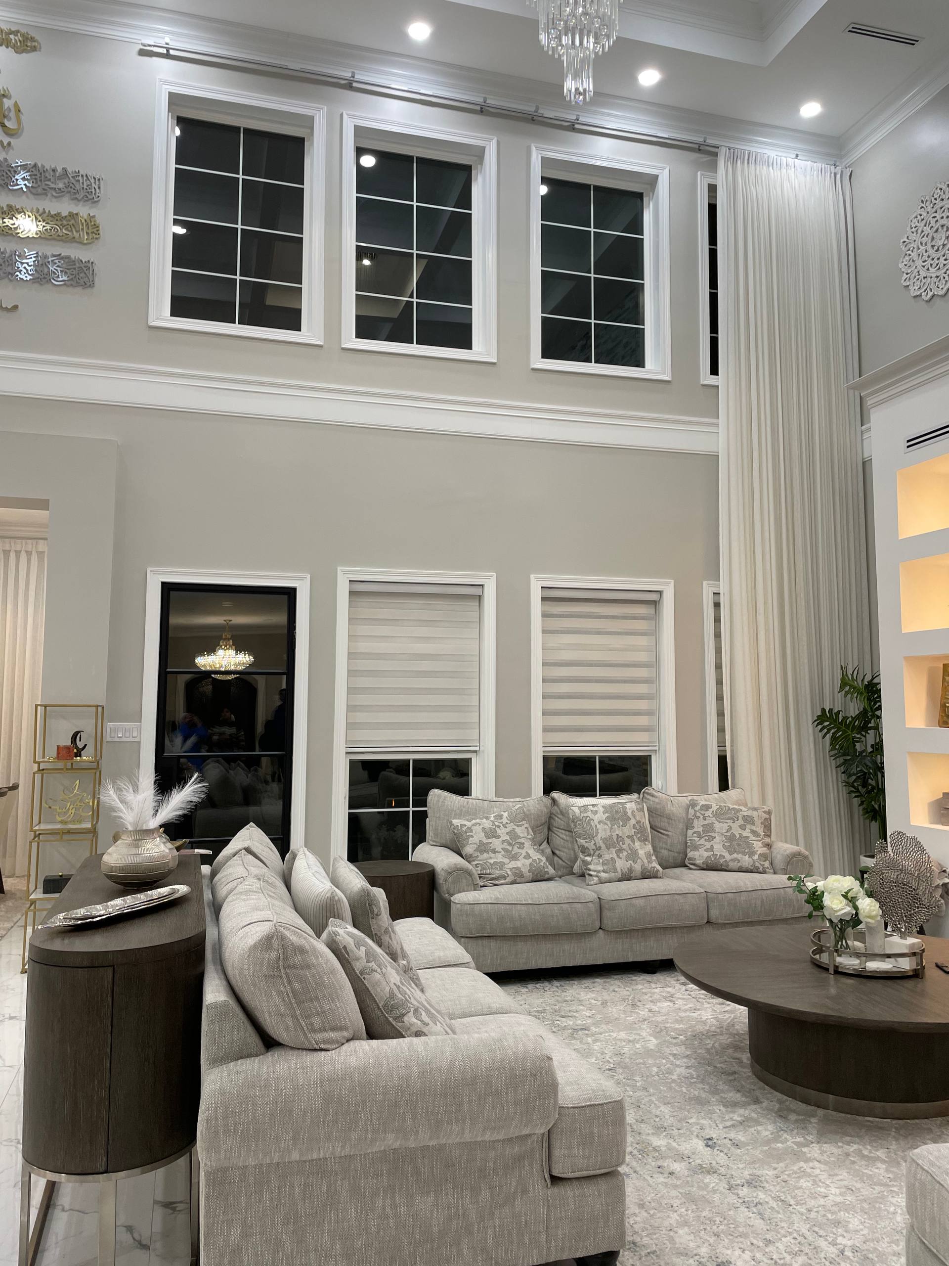 Contemporary living space with minimalist window treatments