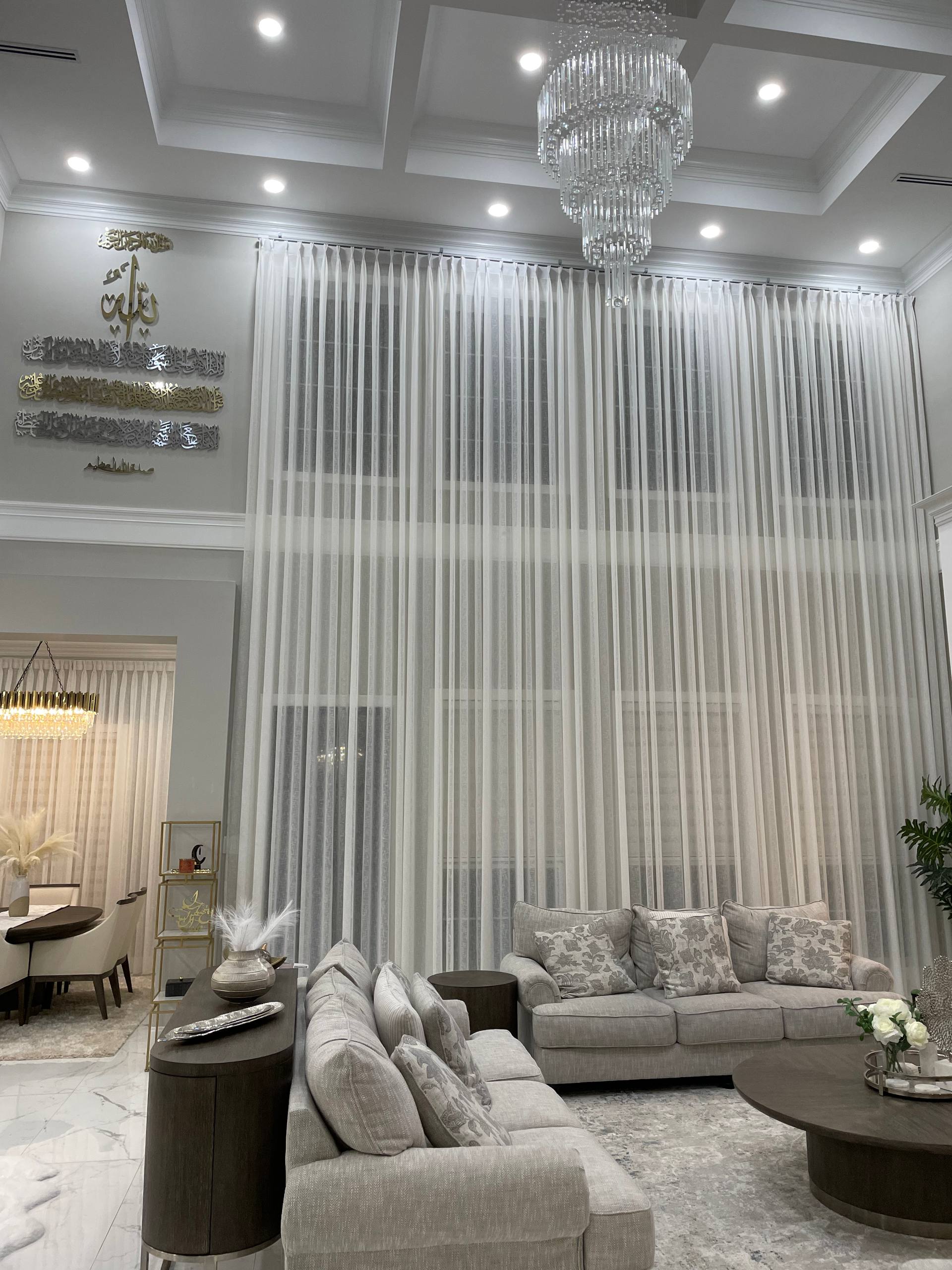 Contemporary living space with minimalist window treatments