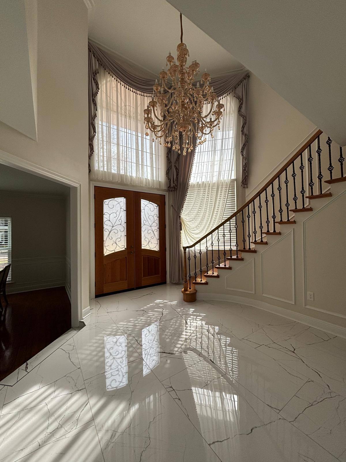 Contemporary living space with minimalist window treatments