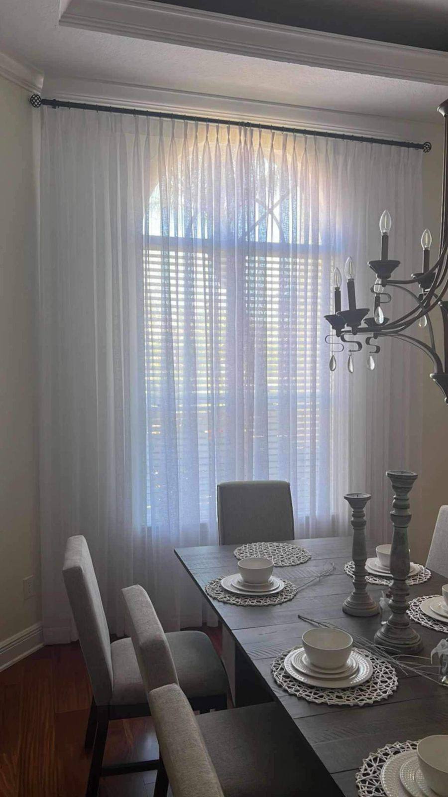 Contemporary living space with minimalist window treatments