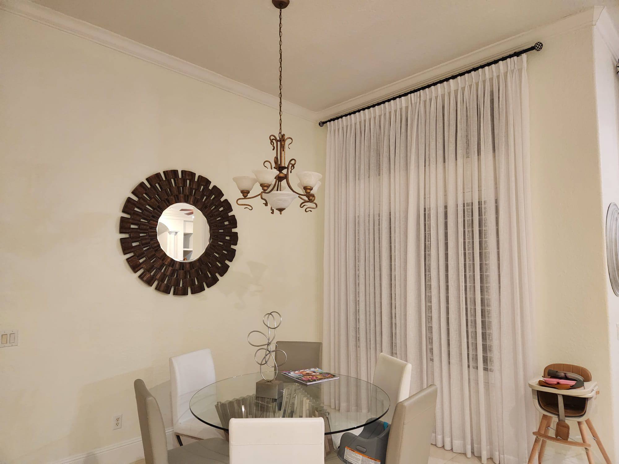 Soft cafe curtains in natural linen with hand-tied bows